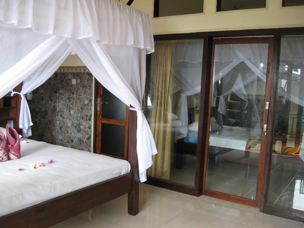 Bukit Indah Homestay Amed Habitación foto